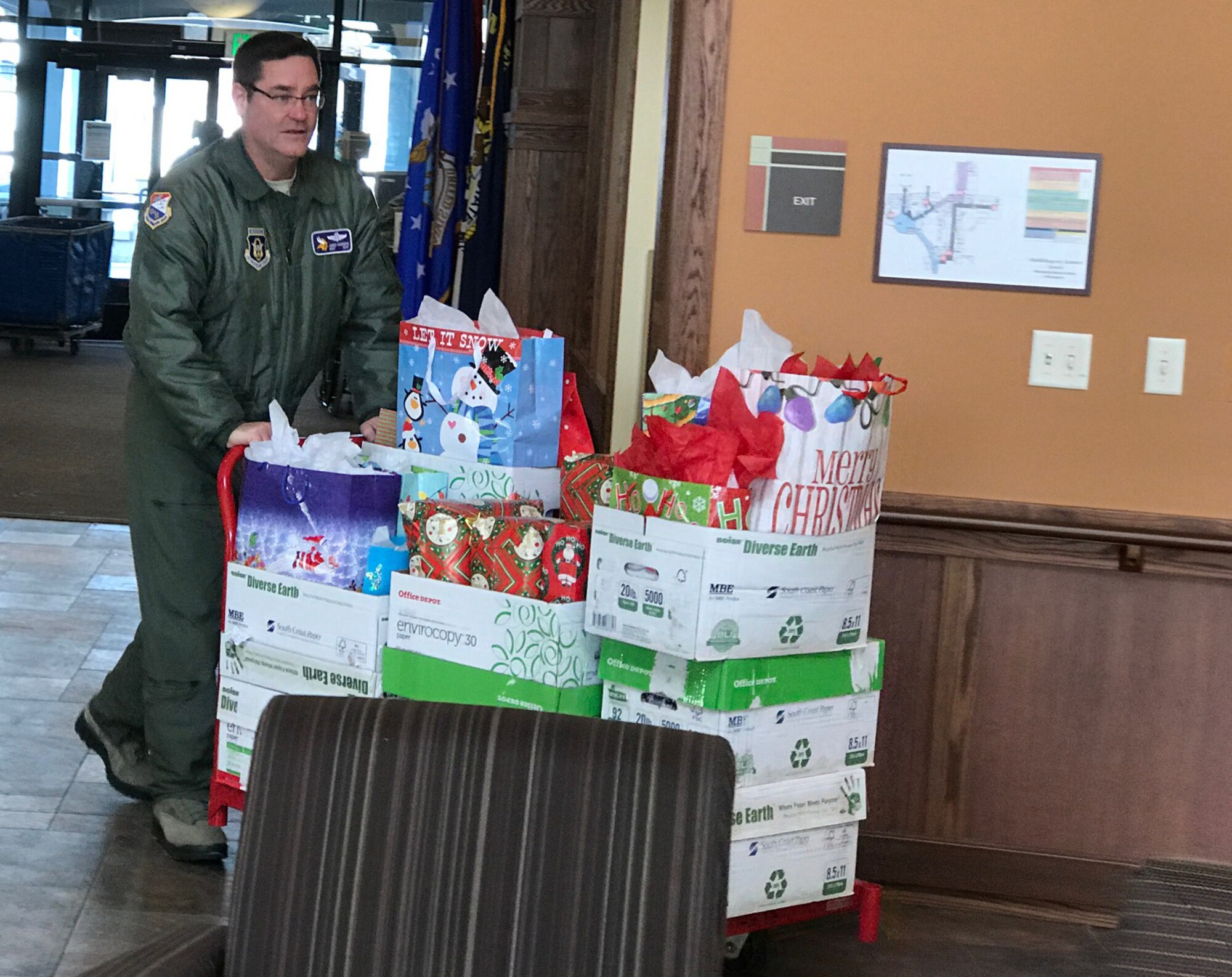 Master Sgt. James Courneya, 934th Operations Group, delivers a load of gifts at the Minnesota Veteran's Home Dec. 15.