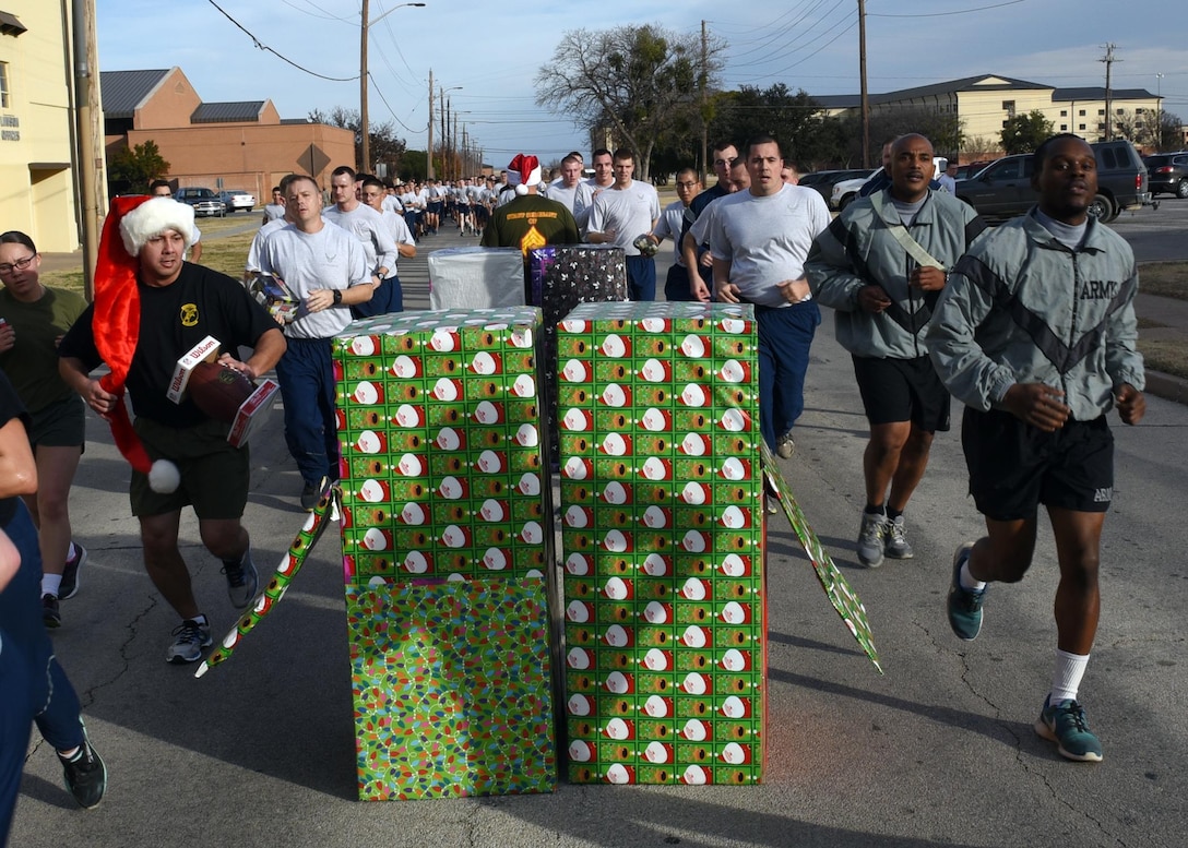 Service members assigned to Sheppard Air Force Base participate in the Santa Hat and Toy Run Dec. 20. The event was designed to boost morale and provide Christmas gifts for children in the local community. (U.S. Air Force photo by David Finley)