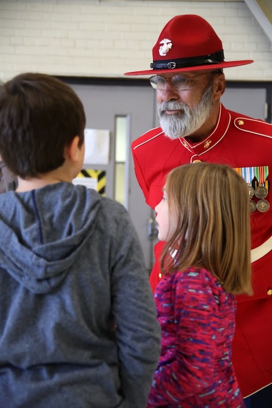 Gunny Claus meets children during a homecoming at Marine Corps Air Station Cherry Point, N.C., Dec. 20, 2016. A detachment of Marines from Marine Attack Squadron 542, Marine Aircraft Group 14, 2nd Marine Aircraft Wing, were attached to Marine Medium Tiltrotor Squadron 264 (Reinforced), Marine Aircraft Group 26, 2nd MAW, 22nd Marine Expeditionary Unit. The 22nd MEU, deployed with the Wasp Amphibious Ready Group, conducted naval operations in support of U.S. national security interests in Europe. (U.S. Marine Corps photo by Sgt. N.W. Huertas/ Released)