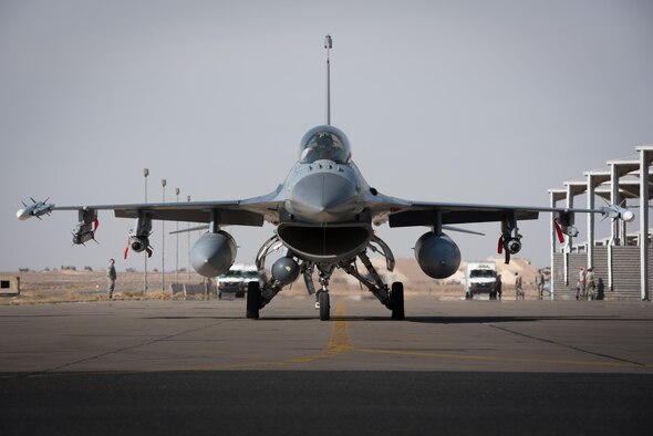 An F-16 Fighting Falcon, deployed with the 134th Expeditionary Fighter Squadron, taxies for a combat mission in Southwest Asia, Dec. 13, 2016. The unit was able to fly combat operations within 15 hours of arriving at the deployed location. (U.S. Air Force photo/Master Sgt. Benjamin Wilson)