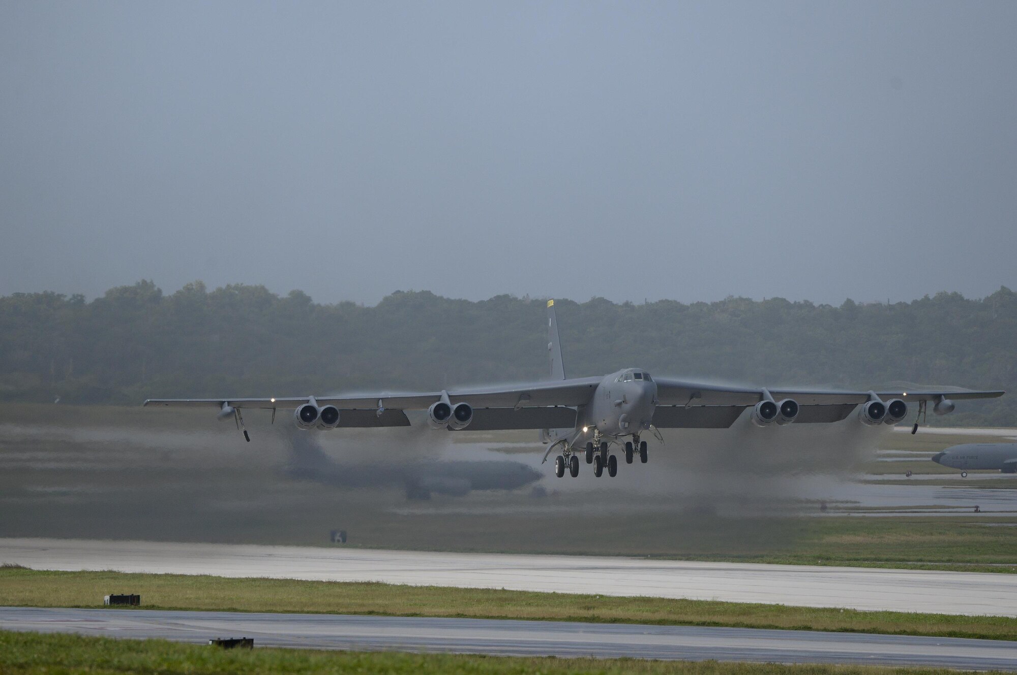 A U.S. Air Force B-52 Stratofortress takes off from Andersen Air Force Base, Guam, after a short deployment Dec. 17, 2016. This short-term deployment helped ensure the bomber crews maintain a high state of readiness and crew proficiency, and provided opportunities to integrate capabilities with regional partners in the Indo-Asia-Pacific region. (U.S. Air Force photo by Staff Sgt. Benjamin Gonsier/Released)