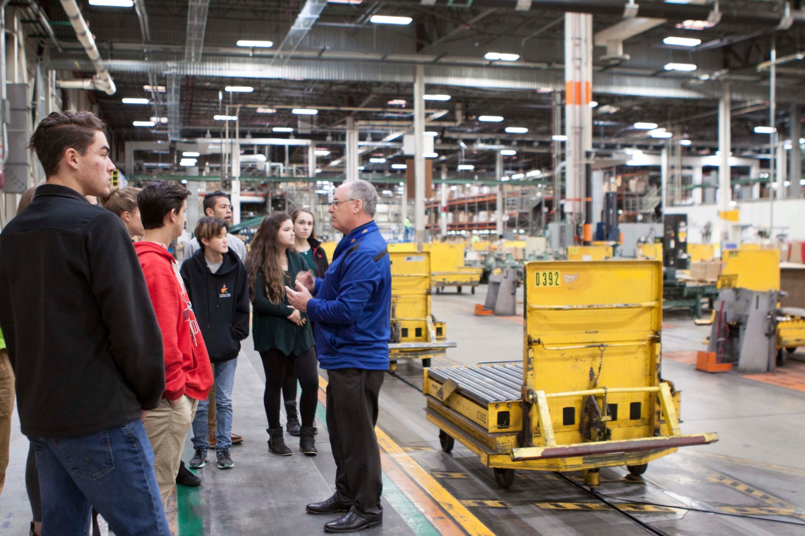 Students from Central York High School tour the Eastern Distribution Center at DLA Distribution Susquehanna, Pa., with employee Ron Hunziker. 