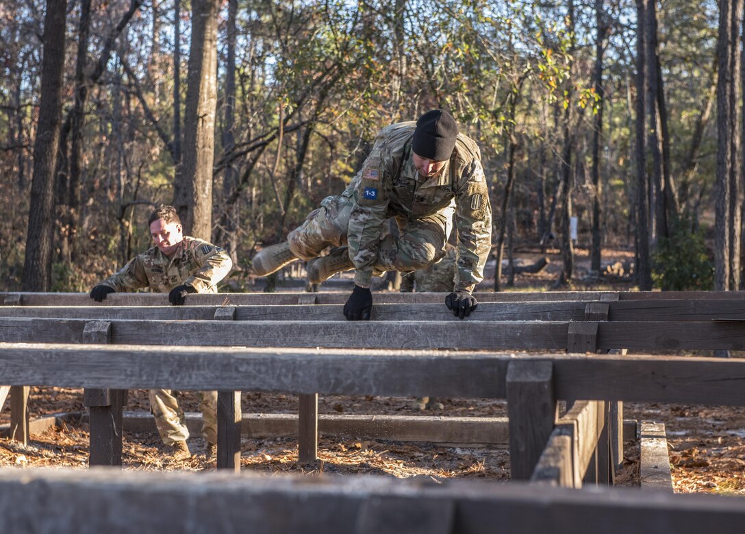 Soldiers participating in the Rubicon Command Team Challenge with the 193rd Infantry Brigade at Fort Jackson, S.C., tackle the six-vaults obstacle, Dec. 9. The Rubicon Command Team Challenge was designed to exercise the leadership and combat skills for the company command teams within the 193rd Infantry Brigade, while at the same time building esprit de corps among the different teams. The challenge was held Dec. 8-9, 2016 at Fort Jackson, S.C. (U.S. Army Reserve photo by Sgt. 1st Class Brian Hamilton/ released)
