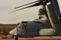 An MV-22 Osprey sits on the runway Dec.12, 2016, at Desert Rock Airport, Nev. Two Ospreys were used in pre-deployment training to evacuate Creech Airmen, who were acting as embassy workers during a non-combatant evacuation operation scenario. (U.S. Air Force photo by Airman 1st Class James Thompson) 