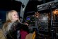 Zaida Knight, daughter of retired Tech Sgt. Michael Knight and his wife, Traci Knight, flies a B-1 bomber simulator at Ellsworth Air Force Base, S.D., Dec. 20, 2016. The simulator consists of two sections, one for flying the plane itself and one for bombing. (U.S. Air Force photo by Airman 1st Class Donald C. Knechtel)