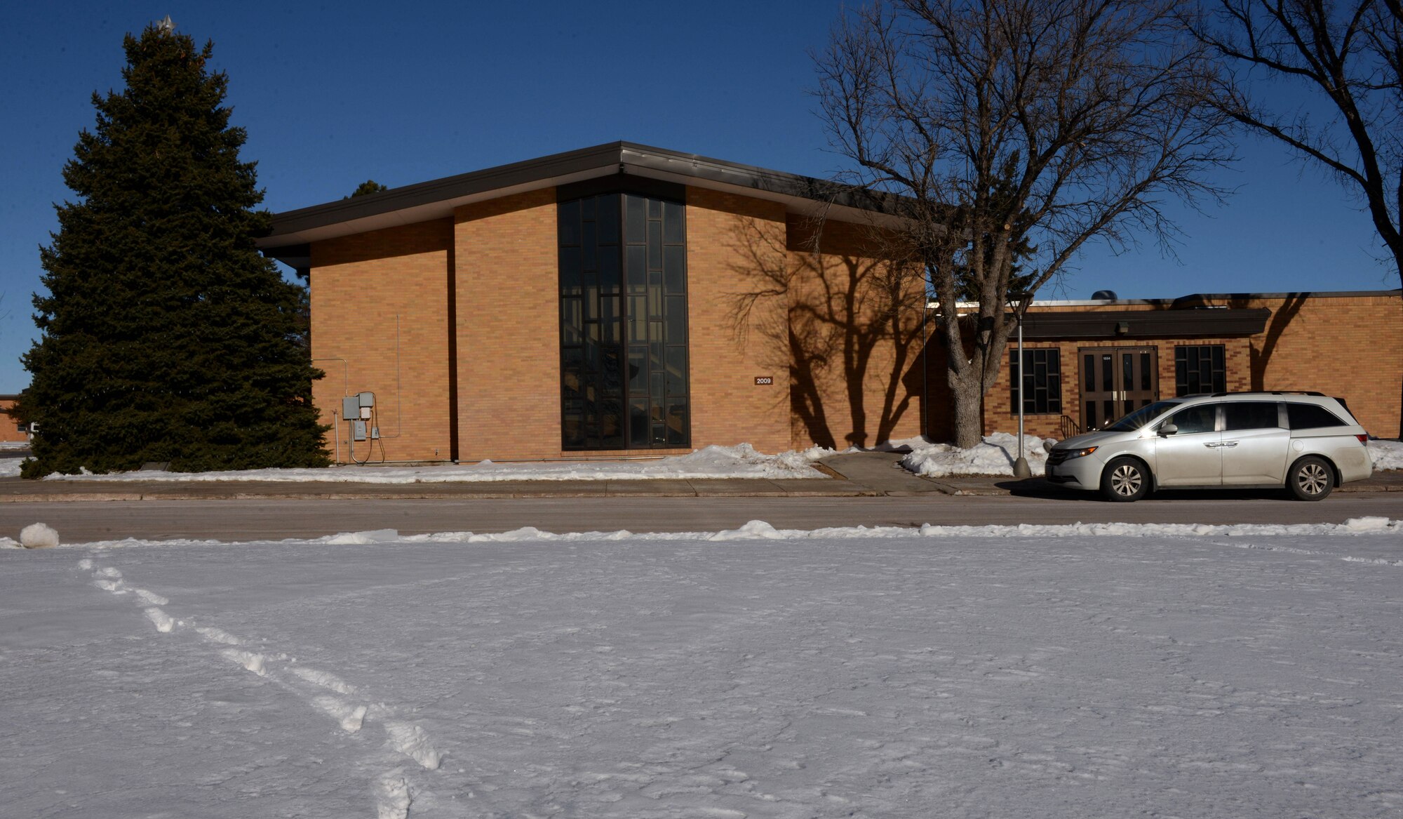 The Freedom Chapel on Ellsworth Air Force Base, S.D., will be conducting Protestant services during the holiday season Dec. 24, 2016. The Protestant candlelight and communion service is scheduled for 5:30 p.m. at the Freedom Chapel on Christmas Eve. There will be no Protestant service on Christmas Day, Dec. 25, 2016. (U.S. Air Force photo by Airman 1st Class Denise M. Jenson)