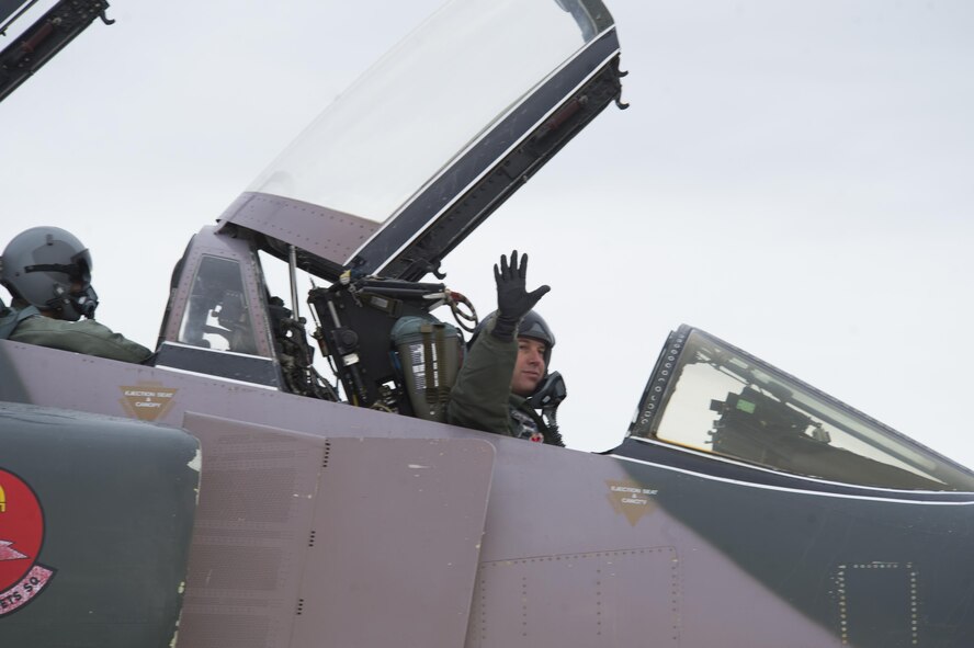 Lt. Col. Ronald King, 82 Aerial Target Squadron Det 1, waves goodbye before taking off during the QF-4 Phinal Phlight event Dec. 21, 2016 at Holloman Air Force Base, N.M. Hundreds of people were in attendance to commemorate the aircraft’s retirement, marking the end of the aircraft’s 53 years of service to the Air Force. (Master Sgt. Matthew McGovern) 
