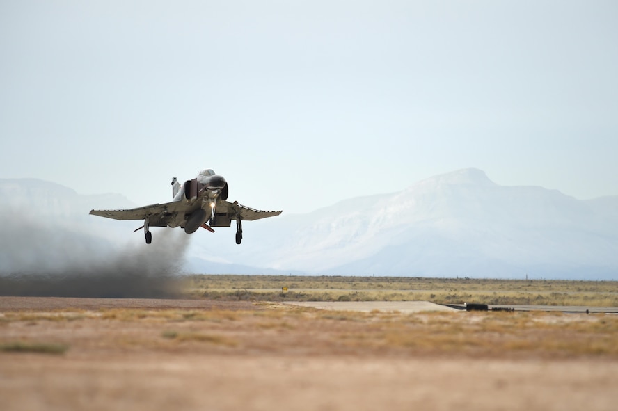 A QF-4 Phantom takes off on the runway during the Phinal Phlight event, Dec. 21, 2016 at Holloman Air Force Base, N.M. More than 500 people were in attendance to commemorate the aircraft’s retirement. (U.S. Air Force photo by Staff Sgt. Eboni Prince)