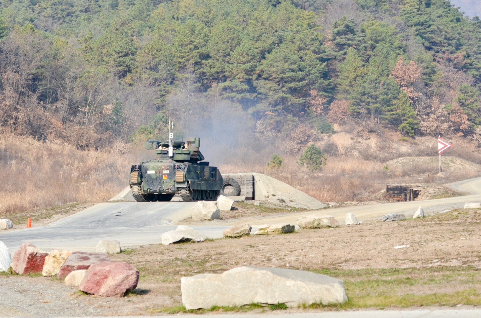 POCHEON, Republic of Korea -- An M2 Bradley Infantry Fighting Vehicle from 2nd Battalion, 34th Armor Regiment, 1st Armored Brigade Combat Team, 1st Infantry Division, conducts a live-fire gunnery range at the Rodriguez Live Fire Complex Nov. 19. The battalion is the first of many from the 1st ABCT, 1st Inf. Div. to conduct a 30-day rotation at the RLFC and will continue to train on their weapons systems in order to deter regional aggression, maintain peace on the Korean peninsula and, if needed, "Fight Tonight" in support of the 2nd Inf. Div. / ROK-U.S. Combined Division alliance. (U.S. Army Photo by 1st Lt. Patrina Lowrie, 2nd Bn. 34th Armor Rgmt./Released)