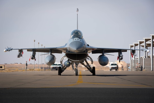 An F-16 Fighting Falcon deployed with the 134th Expeditionary Fighter Squadron taxies for a combat mission from the 407th Air Expeditionary Group, Southwest Asia, Dec. 13, 2016. The unit was able to fly combat operations within 15 hours of arriving at the deployed location.(U.S. Air Force photo/Master Sgt. Benjamin Wilson)(Released)