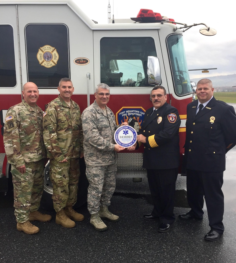 Brig. Gen. Anthony Carrelli, Pennsylvania adjutant general, Brig. Gen. Timothy Hilty, assistant adjutant general – Army, and Col. Robert Hepner, garrison commander, recognized Fire Chief Donald Wilson Nov. 3, 2016, for his role in the successful Department of Health inspection of three emergency response vehicles at Fort Indiantown Gap. 