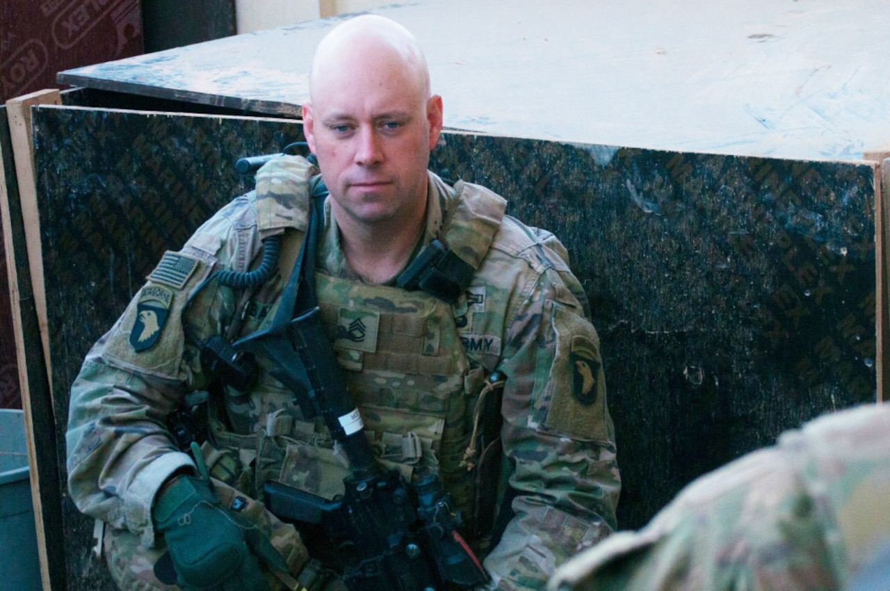 Army Sgt. 1st Class Brian Bailey, the first sergeant of Company A, 1st Battalion 26th Infantry Regiment, Task Force Strike, 2nd Brigade Combat Team, 101st Airborne Division (Air Assault), waits for soldiers to arrive to a security patrol briefing in northern Iraq, Dec. 7, 2016. Army photo by 1st Lt. Daniel Johnson