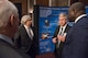 David Merker (speaking), Senior Executive Service Director of the U.S. National Data Center, discusses nuclear treaty monitoring verification with U.S. Secretary of Energy Ernest J. Moniz (left) and Dr. Lassina Zerbo (right), Executive Secretary of the Preparatory Commission for the Comprehensive Test Ban Treaty Organization, at an event on Capitol Hill in Washington D.C., Nov. 30, 2016.  Merker, also the Director of the Air Force Technical Applications Center's Treaty Monitoring Directorate at Patrick AFB, Fla., met with senior officials to participate in the National Nuclear Security Administration's 