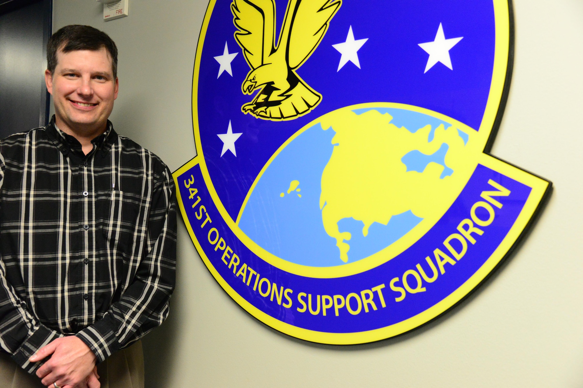 Kevin Younkin, 341st Operations Support Squadron security specialist, poses for a photo Nov. 2, 2016, at Malmstrom Air Force Base, Mont. Younkin works as a communications security manager and assists in training and developing missileers to ensure critical information doesn’t end up in the wrong place or the wrong hands. (U.S. Air Force photo/Airman 1st Class Magen M. Reeves)