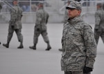 U.S. Air Force Trainee Rachid Karame, 321st Training Squadron, prepares to take the oath of citizenship at the basic military training retreat ceremony at Joint Base San Antonio - Lackland, Texas, Dec. 8, 2016. Trainee Karame and his family emigrated from Lebanon and have lived in the United States since 2012. During the ceremony, he becomes both a U.S. citizen and an Airman. (U.S. Air Force photo by 1st Lieutenant Beau Downey)