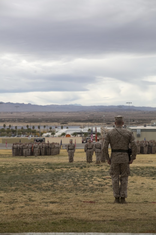 Lt. Col. Christopher T. Steele, outgoing commander, 2nd battalion, 7th Marine Regiment, stands in front of the battalion during 2/7’s change of command ceremony at Lance Cpl. Torrey L. Gray Field aboard Marine Corps Air Ground Combat Center Twentynine Palms, Calif., Dec. 15, 2016.  Steele relinquished command of the ‘War Dogs’ to Lt. Col Jonathan Q. Kenney. ( Official Marine Corps Photo by Cpl. Julio McGraw/Released)