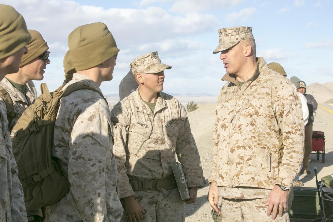 Brig. Gen. William F. Mullen III, Combat Center Commanding General, talks with Marines before they participate in the High Desert Regional Shooting Match at Marine Corps Air Ground Combat Center Twentynine Palms, Calif., Dec. 16, 2016. (Official Marine Corps photo by Cpl. Thomas Mudd/Released)