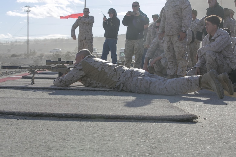 Brig. Gen. William F. Mullen III, Combat Center Commanding General, makes the first shot during the High Desert Shooting Match at Marine Corps Air Ground Combat Center Twentynine Palms, Calif., Dec. 16, 2016. (Official Marine Corps photo by Cpl. Thomas Mudd/Released)