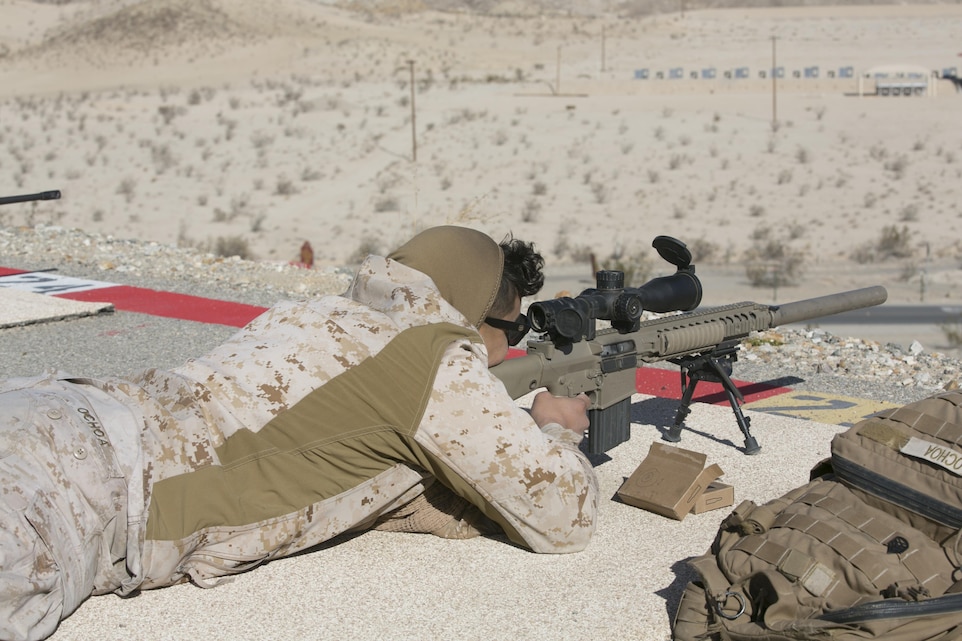 Cpl. Gerardo Ochoa, Combat Center Shooting Team, aims down range during the High Desert Regional Shooting Match at Marine Corps Air Ground Combat Center Twentynine Palms, Calif., Dec. 16, 2016. (Official Marine Corps photo by Cpl. Thomas Mudd/Released)