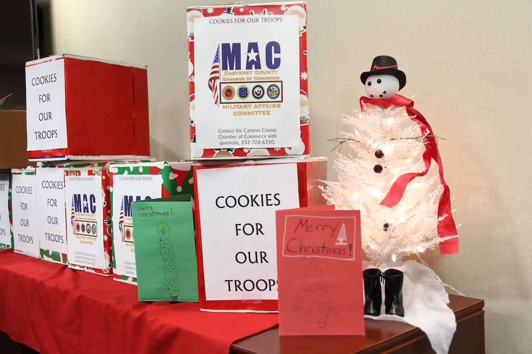 Boxes of donated cookies and Christmas cards are placed on a table during an annual cookie drop aboard Marine Corps Air Station Cherry Point, N.C., Dec. 22, 2016. The Carteret County’s Chamber of Commerce’s Military Affairs Committee donated 26 boxes of cookies to Marines and Sailors on duty aboard the air station. Elementary school students from Carteret County added homemade Christmas cards in the boxes to wish the service members a happy holiday season. (U.S. Marine Corps photo by Cpl. Jason Jimenez/ Released)