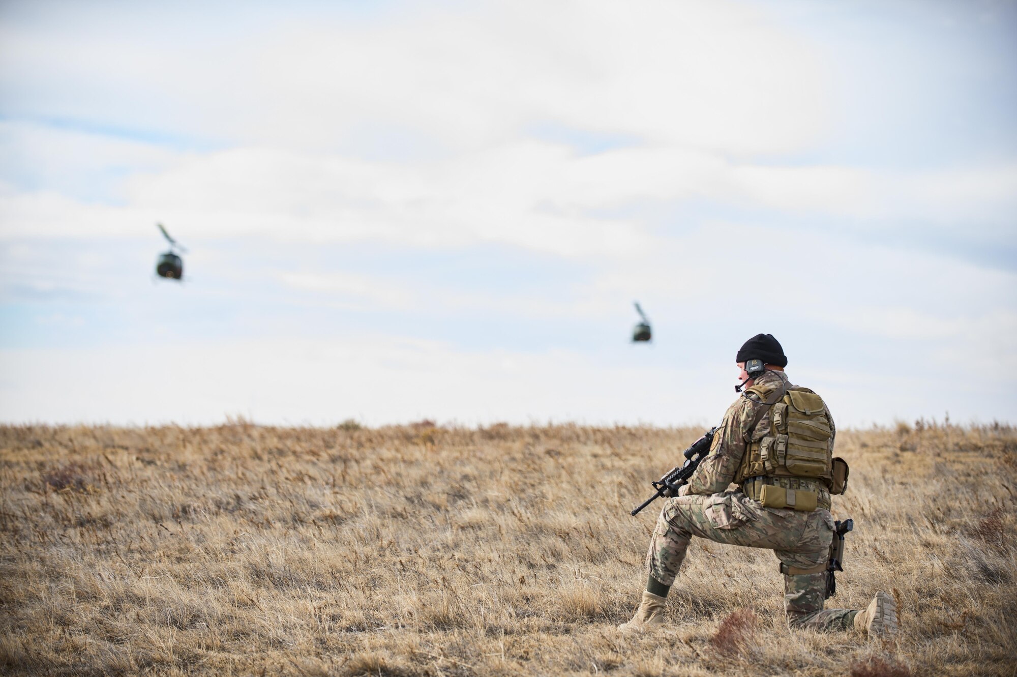 Senior Airman Joshua Hudson, 790th Missile Security Forces Squadron tactical response force assaulter, guards his sector during emergency security response training with the 37th Helicopter Squadron at a launch facility in the F.E. Warren Air Force Base, Wyo., missile complex, Dec. 16, 2016. The 790th MSFS continually conducts training operations and exercises to ensure forces are ready to perform response operations. (U.S. Air Force photo by Staff Sgt. Christopher Ruano)