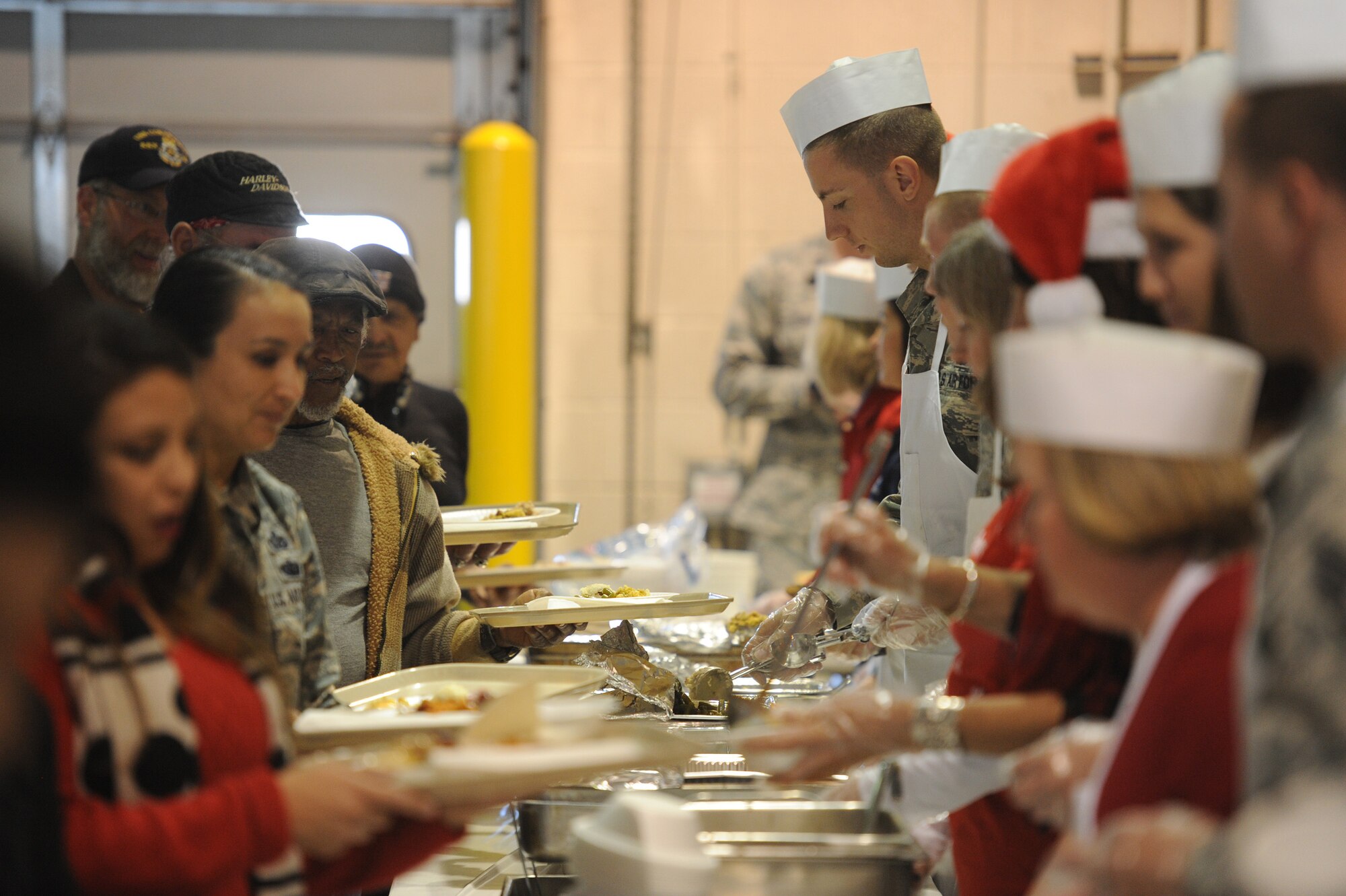 Volunteers served more than 1,700 members of the community full holiday meals, with turkey, enchiladas, posole, mashed potatoes and desserts. at Operation Holiday Cheer, one of Kirtland's biggest charitable events of the year. The event, hosted annually by the Kirtland Air Force Base Fire Department, delivered more than 800 new, high-quality toys to children Dec. 14.  