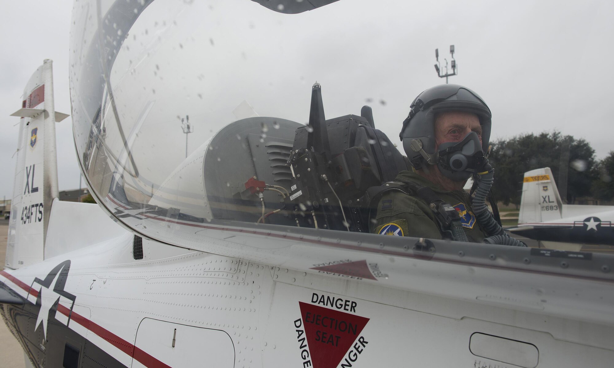 Jerry Yellin, author and retired U.S. Army Air Corps Captain, sits in the rear cockpit of a T-6A Texan II on Laughlin Air Force Base, Texas, Dec. 15, 2016. Yellin was invited to be the guest speaker for Specialized Undergraduate Pilot Training class 17-03 and received an orientation flight while here. (U.S. Air Force photo/Senior Airman Ariel D. Partlow)