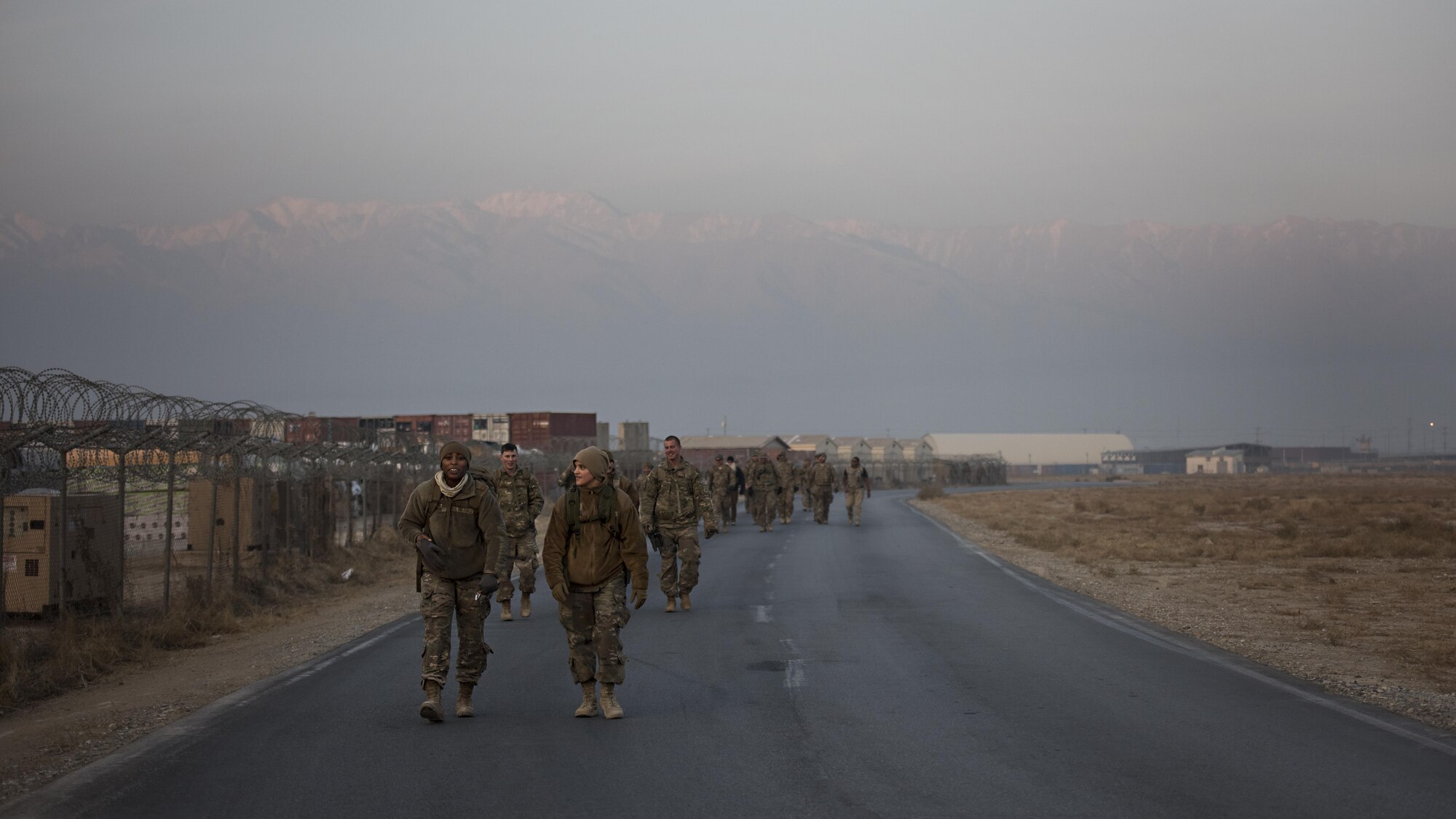 161221-F-TY749-226
Air Force Office of Special Investigations Expeditionary Detachment 2405 and 455th Expeditionary Security Forces Squadron members participate in a “Ruck March to Remember” fallen comrades Dec. 21, 2016 at Bagram Airfield, Afghanistan. Task Force Crimson, which is primarily comprised of Air Force OSI and security forces Airmen, contributes to the joint, multinational force protection efforts for the Bagram Airfield area including outside-the-wire security. (U.S. Air Force photo by Staff Sgt. Katherine Spessa)
