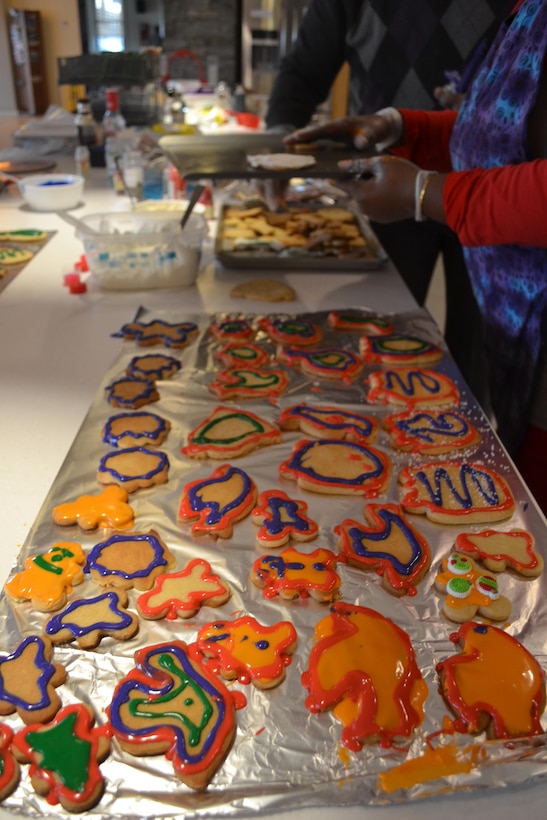 Volunteers from DLA Logistics Operations’ Disposal Policy and Compliance Division baked a variety of holiday-themed and chocolate-chip cookies to help the USO provide cheer to those working Dec. 24-25 at Fort Belvoir, Virginia.