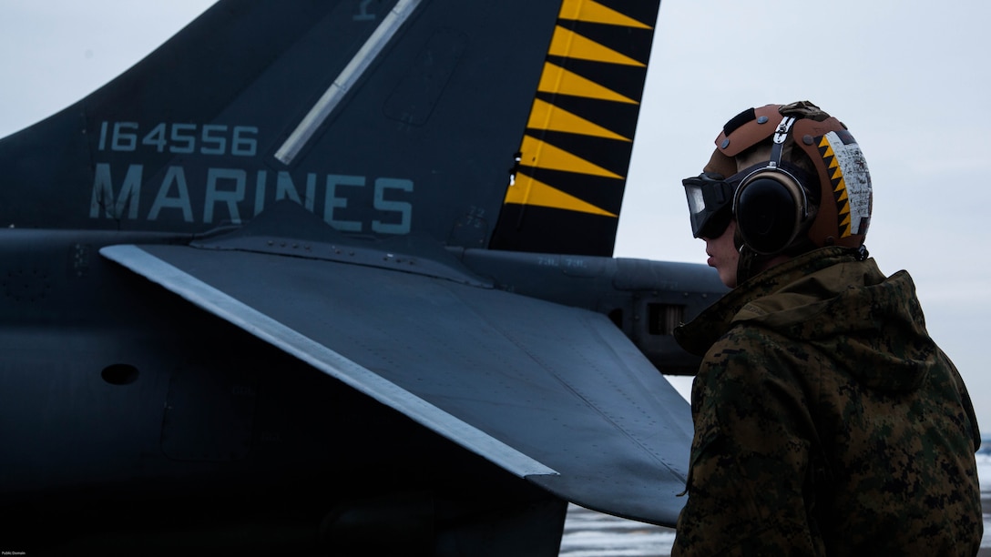 U.S. Marine Corps Lance Cpl. Austin Nazworth, a power line technician with Marine Attack Squadron 542, conducts a routine pre-flight inspection on an AV-8B Harrier during the Aviation Training Relocation Program at Chitose Air Base, Dec. 14, 2016. JASDF and U.S. Marine Corps aircraft fly daily as part of the ATR. The ATR is an effort to increase operational readiness between the U.S. Marine Corps and the Japan Air Self Defense Force, improve interoperability and reduce noise concerns of aviation training on local communities by disseminating training locations throughout Japan. 