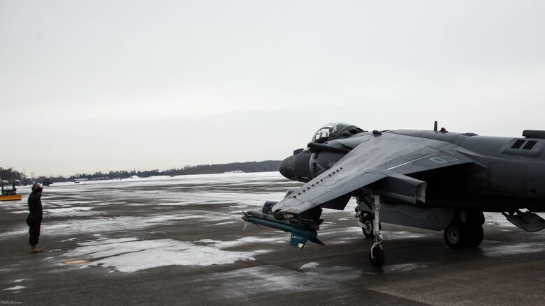 A U.S. Marine Corps AV-8B Harrier with Marine Attack Squadron 542 taxis to the runway during the Aviation Relocation Training Program at Chitose Air Base, Japan, Dec. 14, 2016. VMA-542 is conducting training at Chitose Air Base in an effort to increase operational readiness between the U.S. Marine Corps and the Japan Air Self Defense Force, improve interoperability and reduce noise concerns of aviation training on local communities by disseminating training locations throughout Japan.