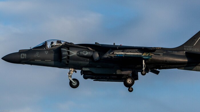 A U.S. Marine Corps AV-8B Harrier with Marine Attack Squadron 542 prepares to land on the runway during the Aviation Relocation Training Program at Chitose Air Base, Japan, Dec. 14, 2016. VMA-542 is conducting training at Chitose Air Base in an effort to increase operational readiness between the U.S. Marine Corps and the Japan Air Self Defense Force, improve interoperability and reduce noise concerns of aviation training on local communities by disseminating training locations throughout Japan. 