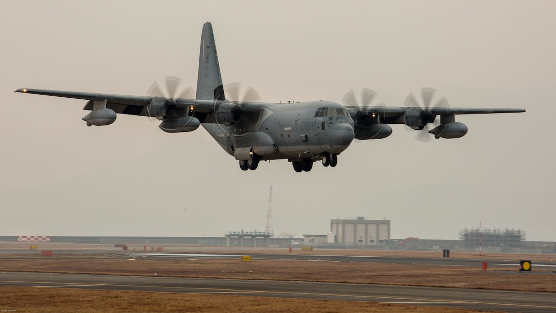 A KC-130J Hercules with Marine Aerial Refueler Transport Squadron 152 prepares to land during aircraft landing zone training at Marine Corps Air Station Iwakuni, Japan, Dec. 21, 2016. The training allows Marines with Marine Air Control Squadron 4 Detachment Bravo, Marine Air Traffic Control Mobile Team, to gain experience, practice constructing an expeditionary airfield, and complete training and readiness requirements. VMGR-152 assisted MACS-4 Detachment Bravo while also completing their training and readiness requirements.