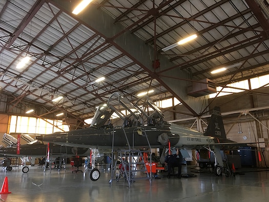 Danny Morin, 47th Maintenance Directorate T-38 Division maintainer, works on a T-38C Talon in a hangar at Laughlin Air Force Base, Texas, Dec. 22, 2016. As of Dec. 14, all 22 T-38s damaged in the February 2016 hail storm were repaired and fully mission capable. (U.S. Air Force photo/Tech. Sgt. Mike Meares)