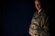Maj. Lindsay Andrew, 47th Flying Training Wing Inspector General inspections team member, poses for a photo on Laughlin Air Force Base, Texas, Feb. 19, 2016. As of Feb. 5, maternity leave for active duty uniformed members has been extended from six weeks to 12. Initiatives pertaining to child care are underway, hoping to improve access and usability to service members. (U.S. Air Force photo/Senior Airman Ariel D. Partlow)