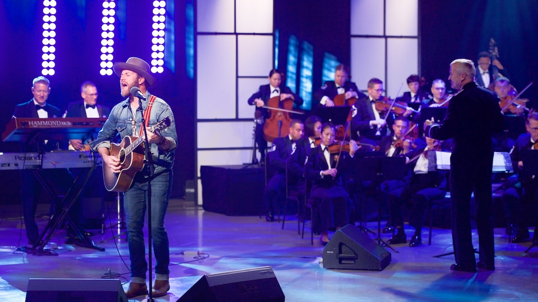 Max Impact and the Strolling Strings back up Drake White on the 2016 Veterans Day tribute at Maryland Public Television. (US Air Force Photo by Chief Master Sgt Bob Kamholz//released)