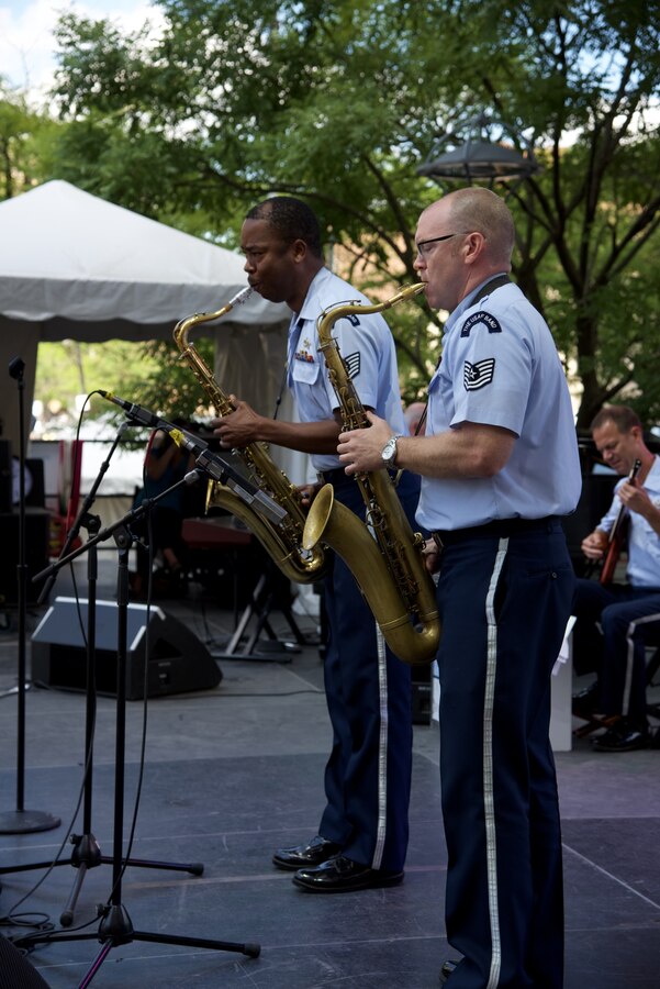 Dueling tenors featuring TSgts Grant Langford and Tedd Baker soloing on MSgt (ret) Alan Baylock's Old School at the Detroit Jazz Festival. (Photo by CMSgt Bob Kamholz/released)