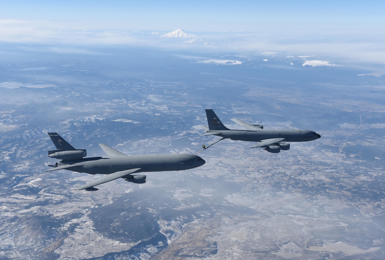 A KC-135 Stratotanker from Beale Air Force Base, California, refuels a KC-10 Extender, from Travis Air Force Base, California, December 22, 2016. The pilots and crew on board the KC-135 are with the 314th Aerial Refueling Squadron, Beale Air Force Base, California, and the pilots and crew aboard the KC-10 are with the 60th Formal Training Unit, Travis Air Force Base, California. (U.S. Air Force photo/ Staff Sgt. Bobby Cummings)