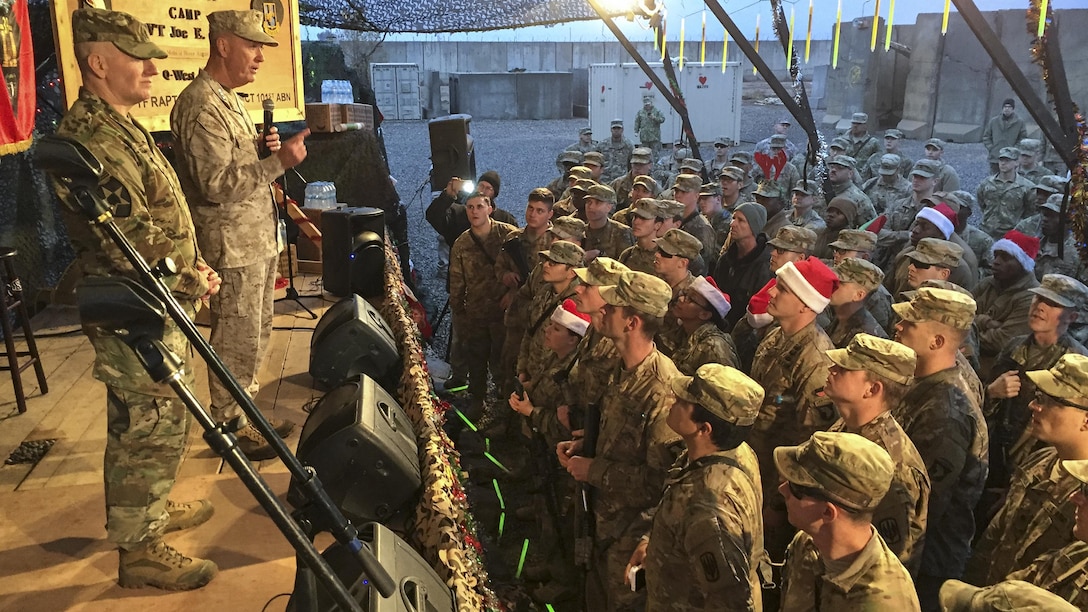 Marine Corps Gen. Joe Dunford, chairman of the Joint Chiefs of Staff, tells service members at Qayyarah West Airfield, Iraq, Dec. 25, 2016, that they are making a difference in the fight against the Islamic State of Iraq and the Levant, and proving that American sacrifices in Iraq are worth it. Dunford brought a USO show to the base for Christmas. DoD photo by Jim Garamone