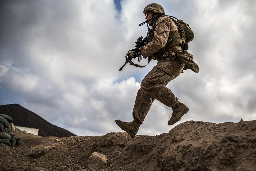 Marine Corps Cpl. Andrew Wilson jumps into a bunker to find cover during a squad assault rehearsal as part of Alligator Dagger, an exercise in Djibouti, Dec. 18, 2016. Wilson is a squad leader assigned to Battalion Landing Team, 1st Battalion, 4th Marine Regiment, 11th Marine Expeditionary Unit. The unit is supporting the U.S. 5th Fleet’s mission to promote and maintain stability and security in the region.
Marine Corps photo by Cpl. Devan K. Gowans
