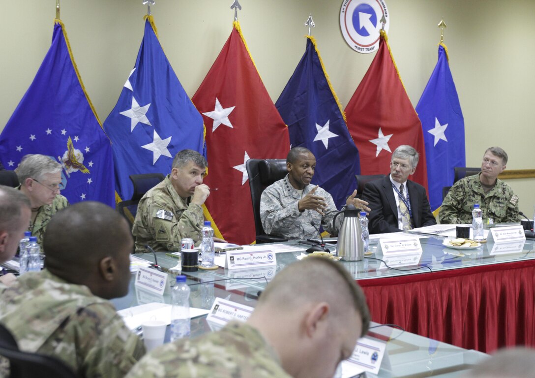 Gen. Darren W. McDew, commanding general of U.S. Transportation Command, speaks with key leaders of joint logistics commands about transportation and distribution of materials challenges in the U.S. Central Command (CENTCOM) area of responsibility at Camp Arifjan, Kuwait, Dec. 13, 2016. The realignment of joint forces has sped up the process of troops receiving vital supplies in the CENTCOM area of responsibility. (U.S. Army Photo by Staff Sgt. Dalton Smith)