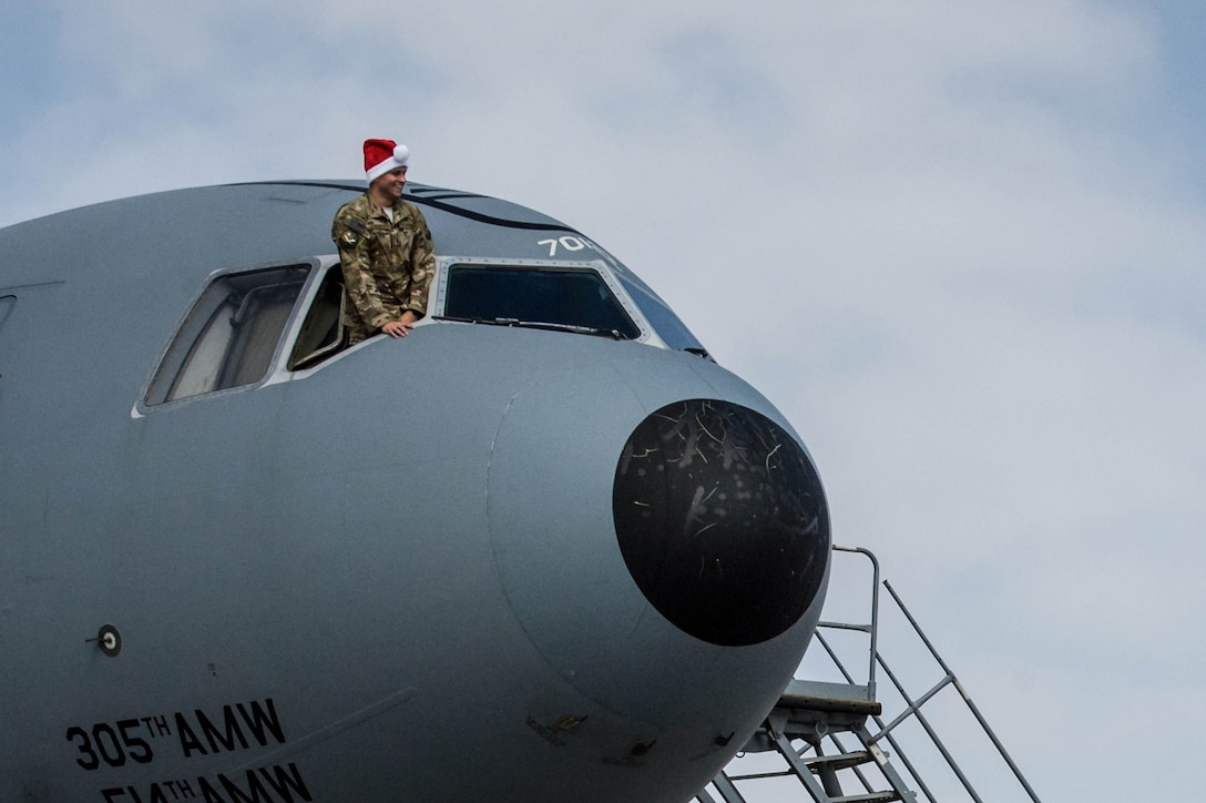 A 380th Air Expeditionary Wing KC-10 Extender pilot, 1st Lt. Andrew communicates with maintainers during a preflight inspection before flying a sortie in support of Combined Joint Task Force-Operation Inherent Resolve at an undisclosed location in Southwest Asia, Dec. 25, 2016. Since Oct. 2016, 380 AEW KC-10s have completed more than 1,500 sorties against Da’esh and Levant operations in Iraq. (U.S. Air Force photo/Senior Airman Tyler Woodward)