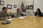 Nora Steigerwalt (left), Medical supply chain director of customer operations, meets with Lt. Col. Christopher Estridge (center) and Maj. Blake Smith, both Air Force medical service corps officers from the Defense Health Agency, at DLA Troop Support in Philadelphia Nov. 16.
