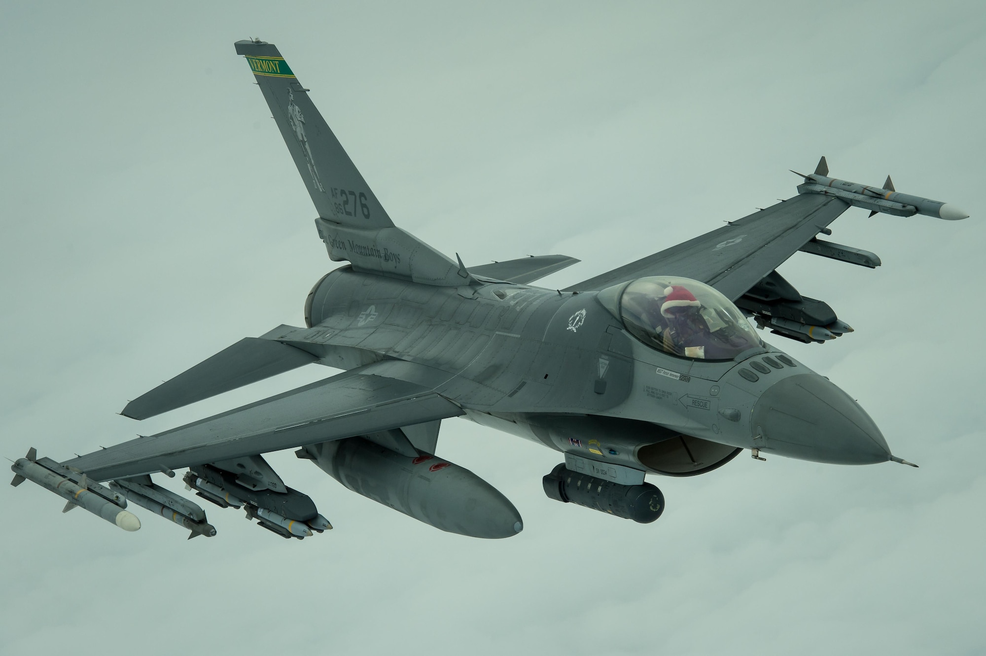 An F-16 Fighting Falcon disconnects from a KC-10 Extender after a successful refueling over Iraq, Dec. 25, 2016. Many pilots wore a traditional red “Santa” hat while flying on Christmas Day. F-16s are providing precision guided close air support during Combined Joint Task Force-Operation Inherent Resolve, a multinational effort to weaken and destroy Islamic State in Iraq and the Levant operations in the Middle East region and around the world. (U.S. Air Force photo | Senior Airman Tyler Woodward)