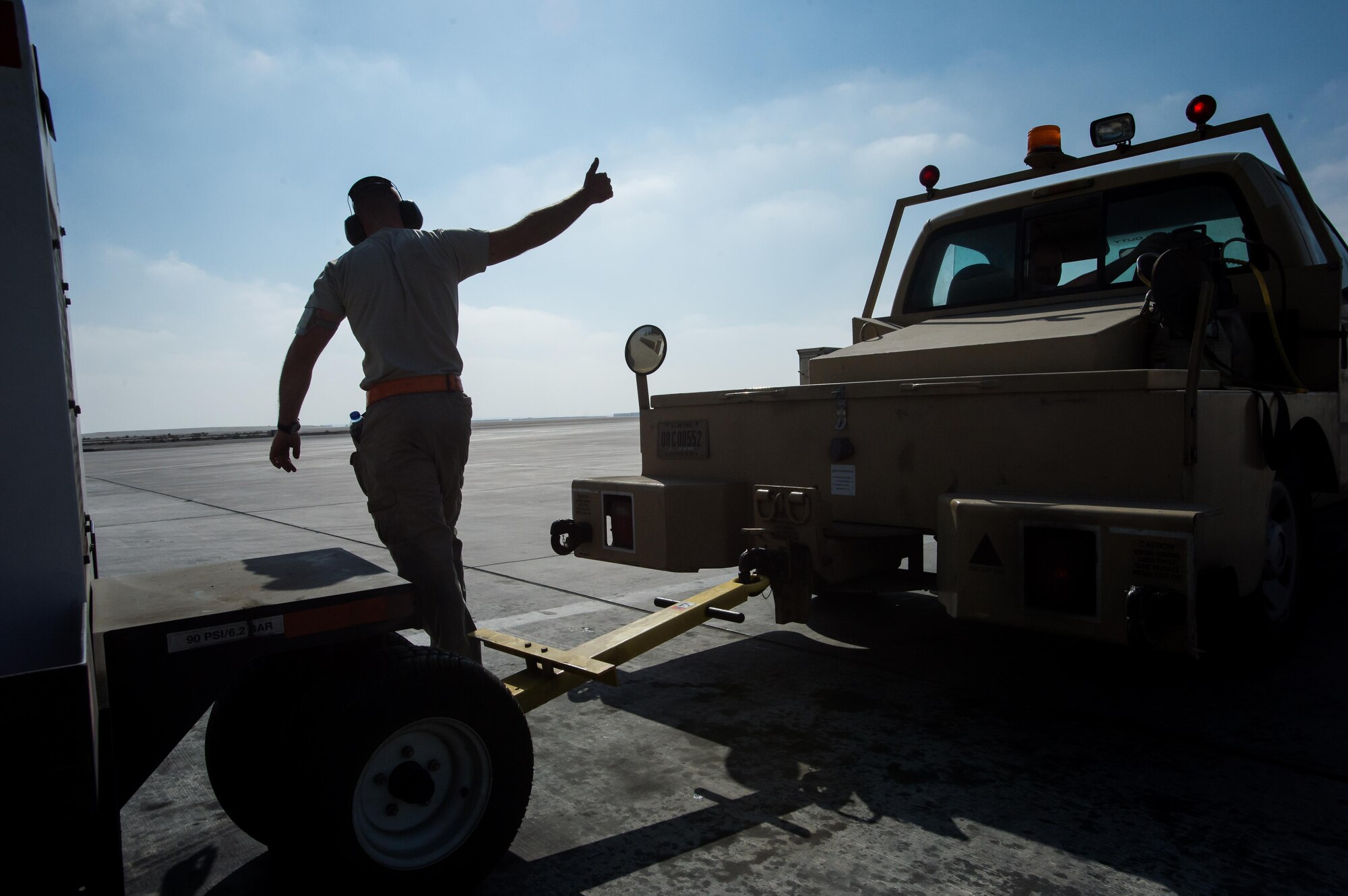 A 380th Air Expeditionary Wing crew chief completes a KC-10 Extender preflight inspection at an undisclosed location in Southwest Asia, Dec. 25, 2016. 380 AEW maintainers have contributed to more than 5,000 strikes during Combined Joint Task Force-Operation Inherent Resolve, a multinational effort to weaken and destroy Islamic State in Iraq and the Levant operations in the Middle East and throughout the region. (U.S. Air Force photo/Senior Airman Tyler Woodward)