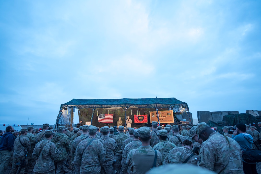 Marine Gen. Joseph F. Dunford, Jr., chairman of the Joint Chiefs of Staff, and Command Sgt. Maj. John W. Troxell, Senior Enlisted Advisor to the Chairman of the Joint Chiefs of Staff, meet with deployed service members at bases across Iraq, Dec. 25, 2016. Dunford, along with USO entertainers, visited service members who are deployed from home during the holidays at various locations across the globe. This year’s entertainers were Chef Robert Irvine, Wrestler Gail Kim, Musicians Kellie Pickler and Kyle Jacobs, and Roastmaster Jeff Ross. (DoD photo by Navy Petty Officer 2nd Class Dominique A. Pineiro/Released)