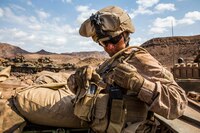 U.S. Marine Sgt. Ty West, a rifleman and scout chief with Light Armored Reconnaissance Company, Battalion Landing Team 1st Bn., 4th Marines, 11th Marine Expeditionary Unit, secures a radio after confirming vehicle positions before a hasty attack live-fire range during Exercise Alligator Dagger, Dec. 18, 2016. Each light armored vehicle crew includes a driver, gunner and four scouts who dismount to survey areas beyond mountains or hills, which aids the LAV team in staying out of vulnerable situations. The unilateral exercise provides an opportunity for the Makin Island Amphibious Ready Group and 11th MEU to train in amphibious operations within the U.S. 5th Fleet area of operations. The 11th MEU is currently supporting U.S. 5th Fleet’s mission to promote and maintain stability and security in the region. 