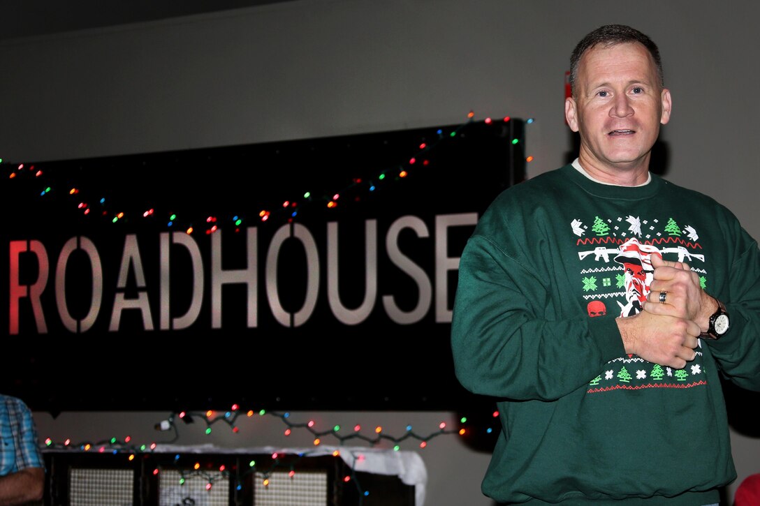 Col. Todd Ferry speaks to attendees during the Single Marine Program’s annual Christmas dinner at the Roadhouse aboard Marine Corps Air Station Cherry Point, N.C., Dec. 25, 2016. The free homemade dinner was open to all single and unaccompanied Marines and Sailors. Activities went on all day at the Roadhouse to include holiday movies, a mega gingerbread house construction and white elephant gift exchange with gifts provided by the SMP. Ferry is the commanding officer of MCAS Cherry Point. (Marine Corps photo by Cpl. Jason Jimenez/ Released)