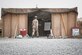 A U.S. Marine walks into the Lil Murica dining facility at the 407th Air Expeditionary Group, Dec. 26, 2016. The fast-food style options available at the Lil Murica D-Fac will be consolidated with the main-line options at the Huntley D-Fac to save money and manpower for the group. (U.S. Air Force photo/Master Sgt. Benjamin Wilson)(Released)