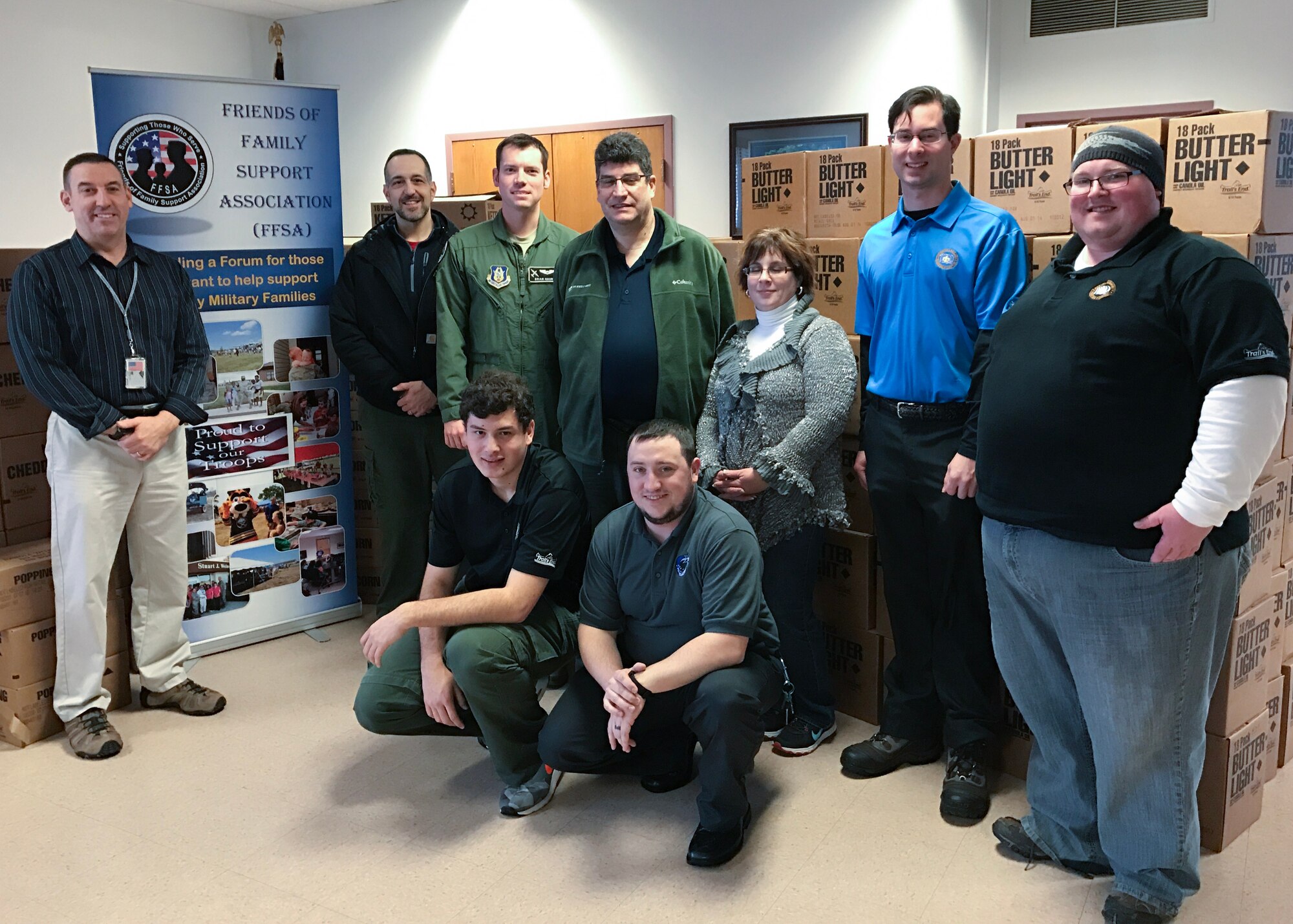 Members of the Boy Scouts of America Greater Niagara Frontier Council delivered 187 cases of popcorn to the Friends of Family Support Association at the Niagara Falls Air Reserve Station, N.Y. Wednesday, December 21, 2016. (U.S. Air Force photo by Staff Sgt. Richard Mekkri)
